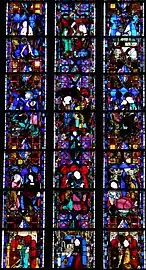 Verrière de la vie du Christ datant du XIVe siècle, avec les donateurs.