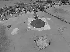 La tête de puits matérialisée no 9 bis.