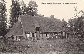 Vieille chaumière à colombages et toit de chaume. (carte postale vers 1920)