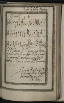 une photo d'une partition de musique avec des paroles, elle a l'air ancienne et on peut voir en bas à droite qu'elle est signée par Jacob Prætorius