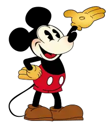 Représentation de Mickey Mouse en couleurs, la main gauche levée.