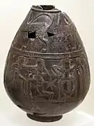 Olpé (ὄλπη) en bucchero, montrant un match de boxe, -630.