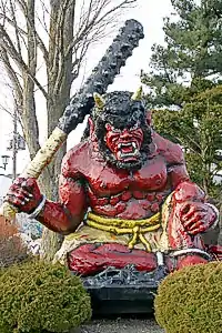 Statue d'un oni armé d'un kanabō.
