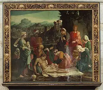 Peinture représentant, au premier plan, le Christ mort et entouré d'une dizaine de personnages, en majorité des femmes. En arrière-plan, l'entrée d'une grotte, des cavaliers et une ville sont visibles.