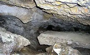 Conduit dans le pendage.