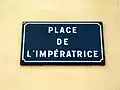 Plaque de la Place de l'Impératrice en façade de l'église