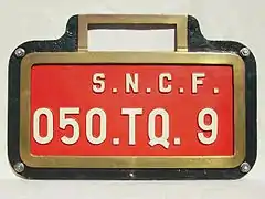 Plaque unifiée de 050 TQ, le cadre en laiton est d'origine PLM.