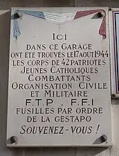 Plaque au no 65.