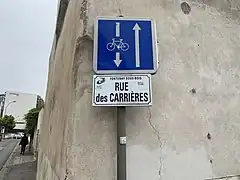 Double-sens cyclable signalé par le panneau C24a