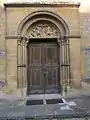 Porte de la collégiale Saint-Étienne.