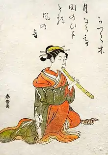 Portrait ukiyo-e par Suzuki Harunobu d'une femme jouant du shakuhachi (flûte chinoise en bambou).