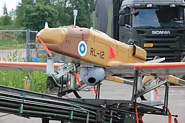 Détail sur le senseur électro-optique TV/IR et les patins d’atterrissage