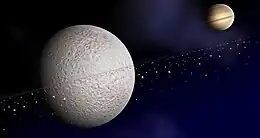 Une vue d'artiste des possibles anneaux de Rhéa.