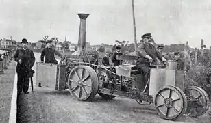 Édouard Rossel (1882), ingénieur-constructeur de camions et locomotives à vapeur (affiche de l'exposition universelle de 1900)