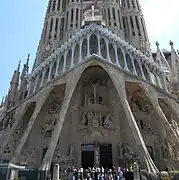 Façade de la passion.1954-1976Fronton installé en 2015[réf. souhaitée]Croix majestueuse en 2018[réf. souhaitée].