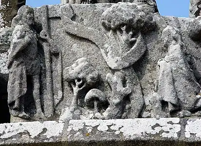 Le calvaire de Tronoën, le Christ et sainte Madeleine (Noli me tangere), face est, registre supérieur.