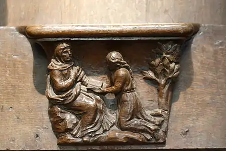 Stalle de l'église de Saint-Sulpice-de-Favières, XIVe – XVe siècle.