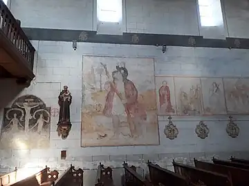 Saint Christophe début 16e à sa place traditionnelle près de l'entrée.