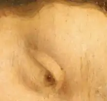 Gros plans sur l'œil droit et le front de la Vierge.