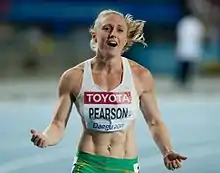 Photographie de Sally Pearson à l'arrivée d'une course