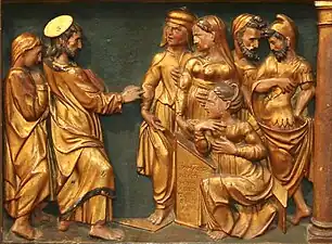 Marie-Madeleine écoute la prédication de Jésus.