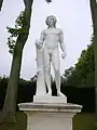Louis-Aimé Lejeune et René Grégoire, Bacchus appuyé sur un tronc d'arbre et tenant une grappe de raisin.