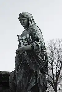 Érato (1867, détail), tombe de Joseph Mery, Paris, cimetière de Montmartre.