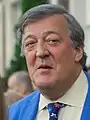 Stephen Fry dans le rôle de Gilbert / Le Lopin du Ménétrier