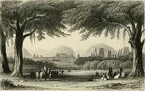 Vue externe sur la cité fortifiée de Madura, son temple (à droite) et son palais (non loin, à gauche), réalisé en 1858.