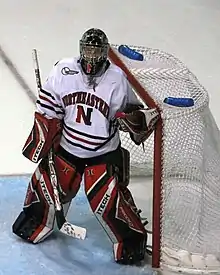 Thiessen avec le maillot blanc des Huskies.
