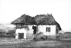 Aquarelle de Toma T. Socolescu - Ancienne maison de Ploiești (Județul Prahova, Roumanie) tel qu'il en existait jusqu'au début du XXe siècle.