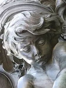 Détail d'un des putti de la Richesse.