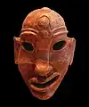Masque négroïde de Dermech, H 0,19 m, terre cuite moulée et retouchée (VIIe – VIe siècle av. J.-C.).