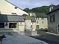 Une fontaine dans le centre de Béost.