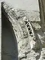 Croisillon sud, mur oriental, archivolte du portail bouché.