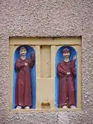 Les statuettes de saints Côme et Damien.