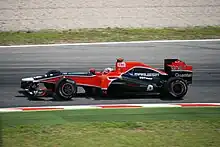 Photographie de Timo Glock dans sa monoplace au Grand Prix automobile d'Espagne