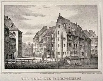 Vue de la rue des Bouchers, lithographie de Franz Josef Sandmann (de) imprimée par Simon.