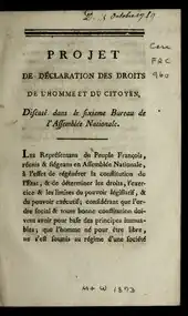 Photographie d'une page d'un livre annotée sur les côtés.
