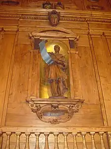 Photo d'une statue en bois d'Hippocrate dans le théâtre anatomique de Bologne.