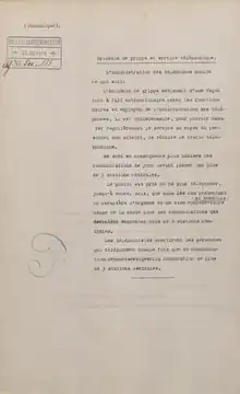 Copie d’une lettre dactylographiée en français, portant en haut à gauche un tampon en allemand, avec une date et un numéro.